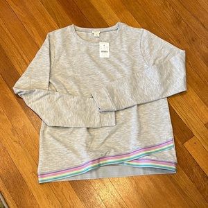 NWT girls' crew neck sweatshirt with rainbow hem. Size XXL.